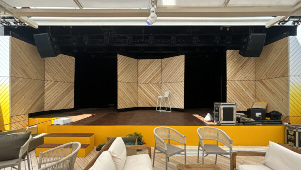 Image of stage with movable wooden panels