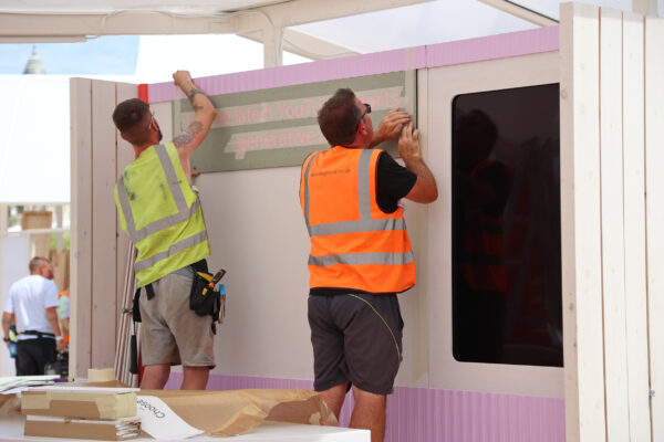 Image of team installing signage