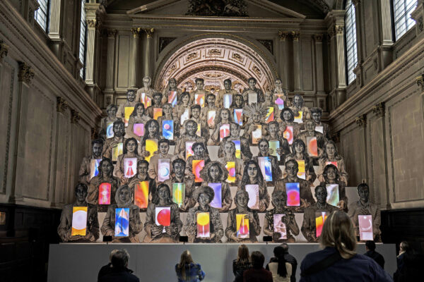 Congregation installation designed by Es Devlin - 7 tiers of large portraits with projection mapped imagery