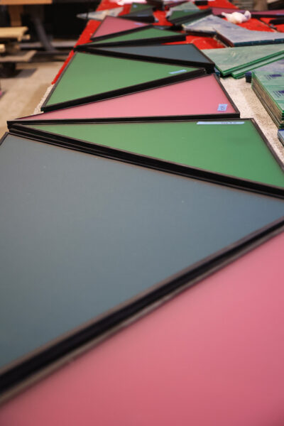 Selection of triangular shaped colour perspex panels