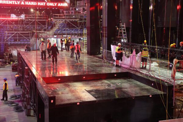 Image of workers on stage during installation