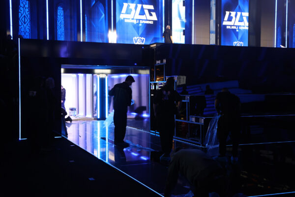 Image of workers removing film from floor covering