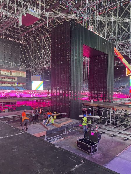 Image of steel arch stood over stage catwalk